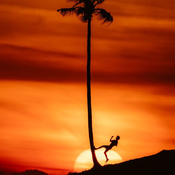 Person feeling vibrant and energetic in a natural landscape.